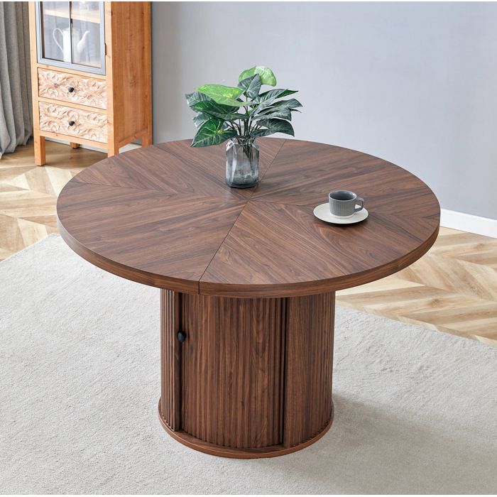 Table à manger ronde 115 cm en MDF aspect bois noyer pied central avec rangement pour 4 à 6 personnes