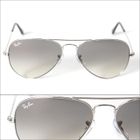 RAY BAN Lunettes de soleil Mixte Modèle Aviator - Catégorie 2 - Monture métal - Verres gris dégradés