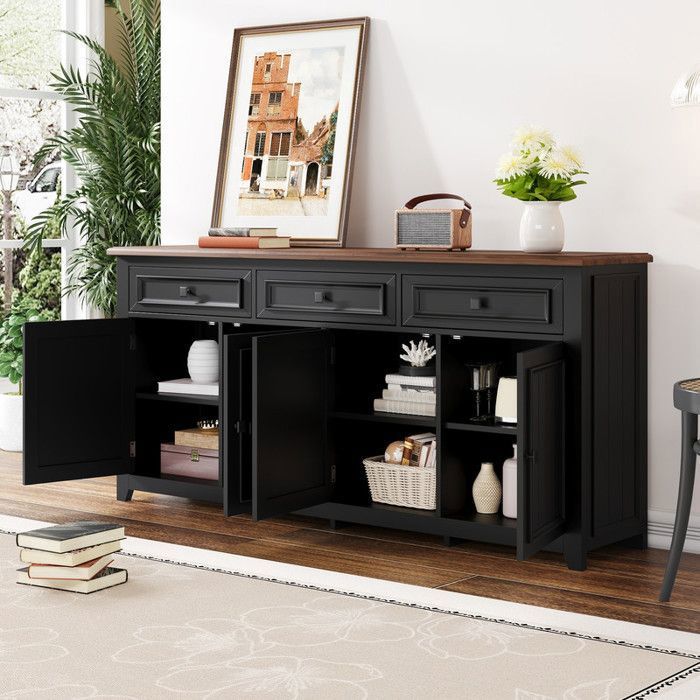 Buffet à quatre portes et trois tiroirs buffet bas de 160×35×76cm grand espace de rangement coloris bois noir moderne.