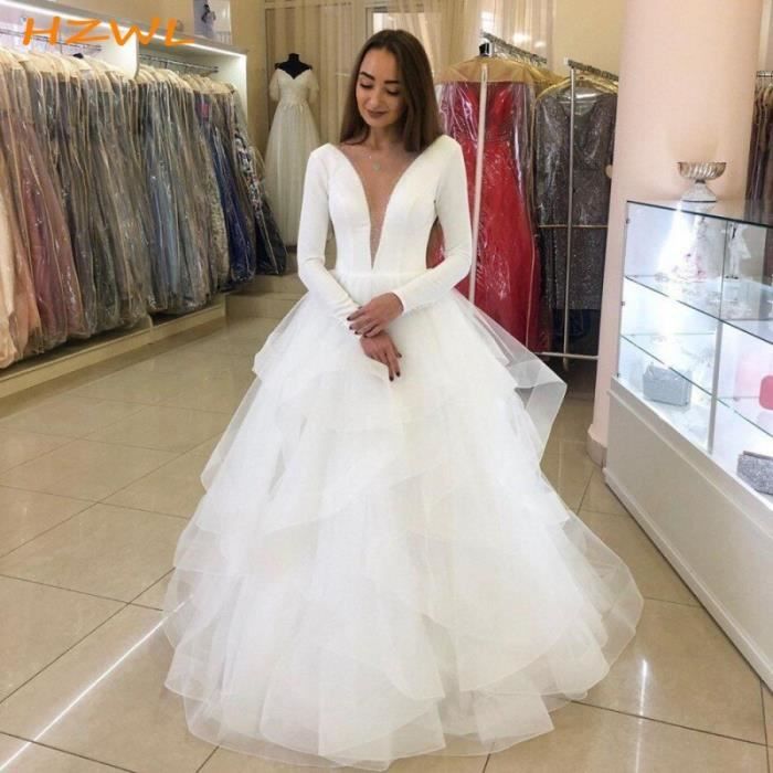 Robe de mari e blanche d collet en V plongeant jupe plusieurs