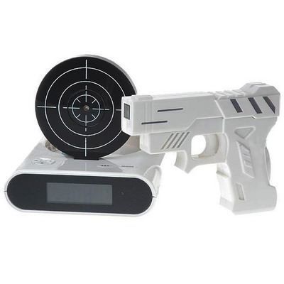 Réveil matin cible et pistolet blanc