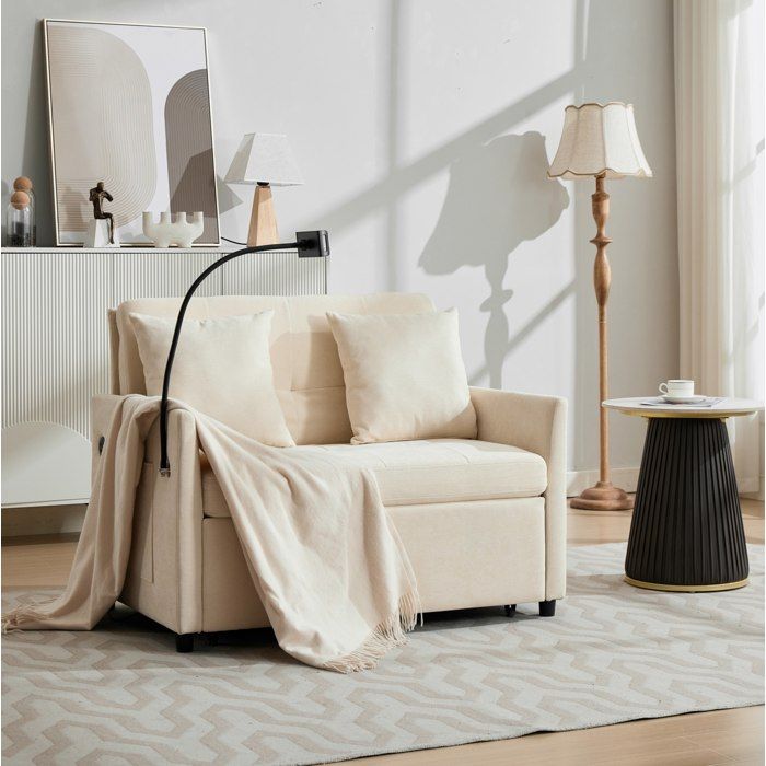 Fauteuil lit convertible 1 place en tissu beige avec port USB et support tablette 109 x 82 x 82 cm