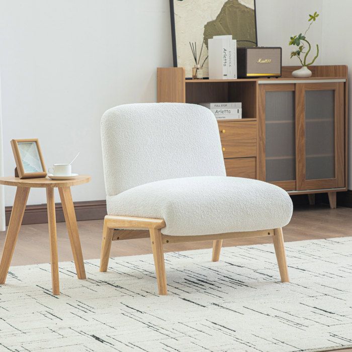 Fauteuil lounge scandinave 1 place en chenille ivoire sans accoudoirs pieds en bois massif