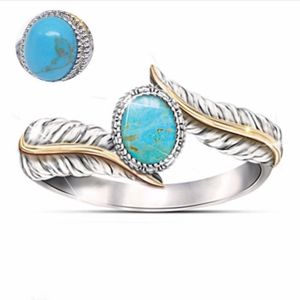 Bague femme pierre bleue courbes