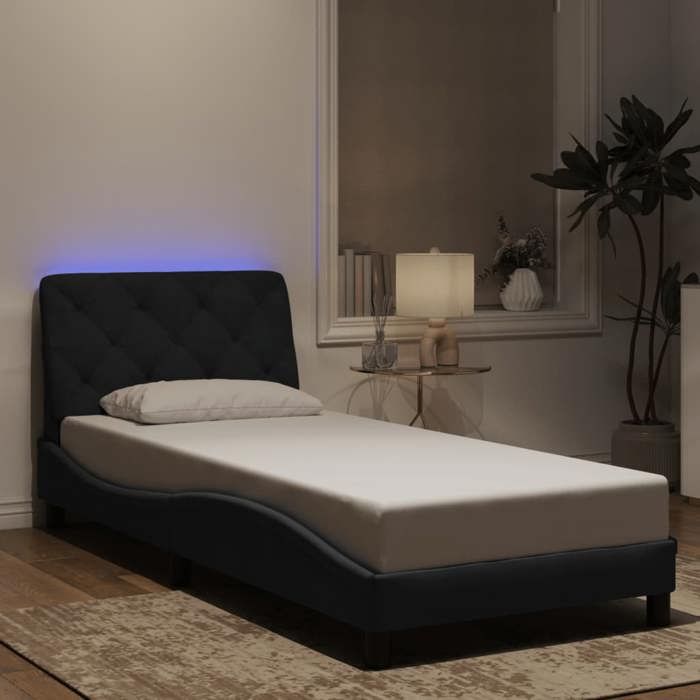 Structure de lit avec LED - UU - 90x190 cm - Noir - Velours - Bande LED 55 cm - Coussin de tête de lit - Design ondulé Structure de lit avec LED - UU - 90x190 cm - Noir - Velours - Bande LED 55 cm - Coussin de tête de lit - Design ondulé