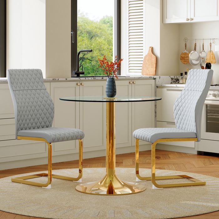 Ensemble table-chaise moderne - Table ronde en verre - Diamètre 85 cm - Supports métalliques dorés - 2 chaises modernes