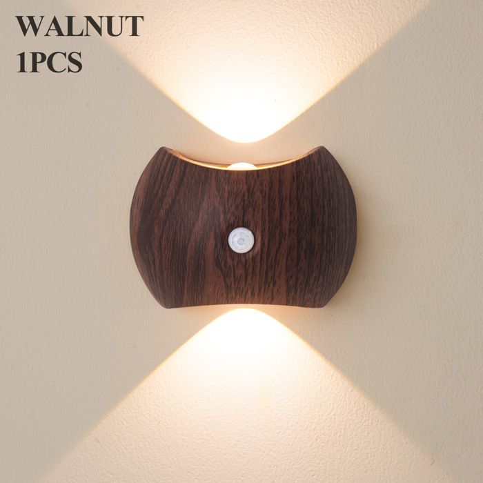 Cette applique murale rechargeable en noyer offre trois niveaux de luminosité un design minimaliste et moderne et se f