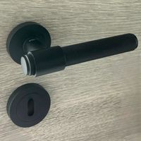 Poignées de porte sur rosace ronde noir industriel - Modèle Ema Trou de clé L