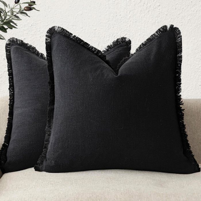 Taies doreiller lot de deux coussins bohèmes pour canapés méridiennes et salons 45 x 45 cm noir.