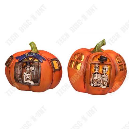 Décoration d'halloween, sorcière dans une citrouille - Un grand marché