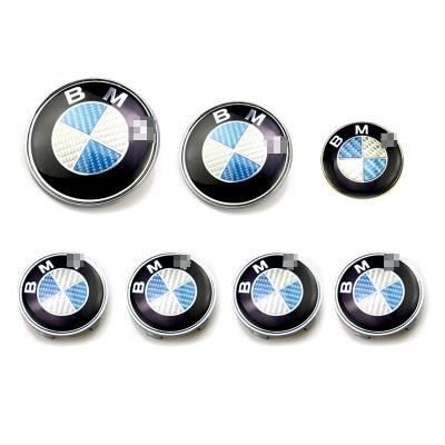 KIT 7 Badge LOGO Embleme BMW Carbone Merlan bleu Capot82 + Coffre74mm +Volant + 4 centre de roue