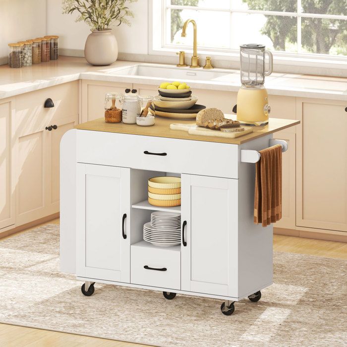 Îlot de cuisine à roulettes blanc MDF plan de travail rabattable portes soft-close tiroirs et porte-serviette
