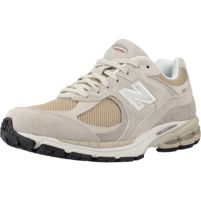 New Balance Chaussure New Balance Modèle U2002 - Coleur Brun Clair