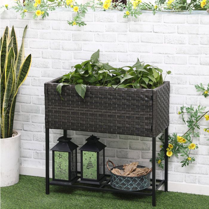 Jardinière haute Marron 70 x 30 x 72 cm avec étagère inférieure poly rotin et cadre métal