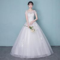 Robe de mariée blanche à une seule épaule mariée simple tempérament queue traînante mince robe de mariée pour femme