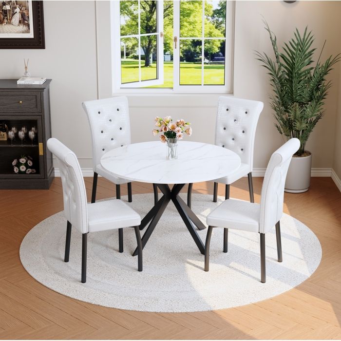 Ensemble table ronde effet marbre blanc et 4 chaises blanches piètement métal noir style moderne