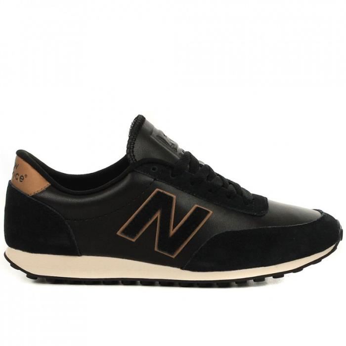 new balance noire et dorée