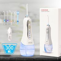 Nettoyeur de dents d'irrigateur oral sans fil électrique fil dentaire IPX7 étanche USB chargement 300 ML pour les voyages à