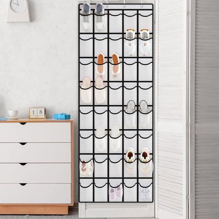 Rangement mural - Filet de rangement avec 24 cases et 4 crochets - Pour jouets et peluches - Noir et blanc