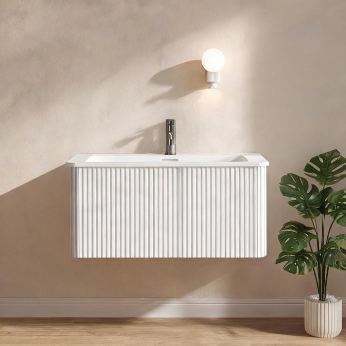 Meuble vasque suspendu 80 cm avec vasque en Solid Surface blanc et façade rainurée design mural gain de place
