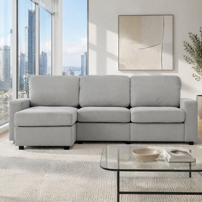 Canapé d’angle réversible 3 places avec 4 coffres ottomane ressorts ensachés tissu polyester gris clair 245 5 cm