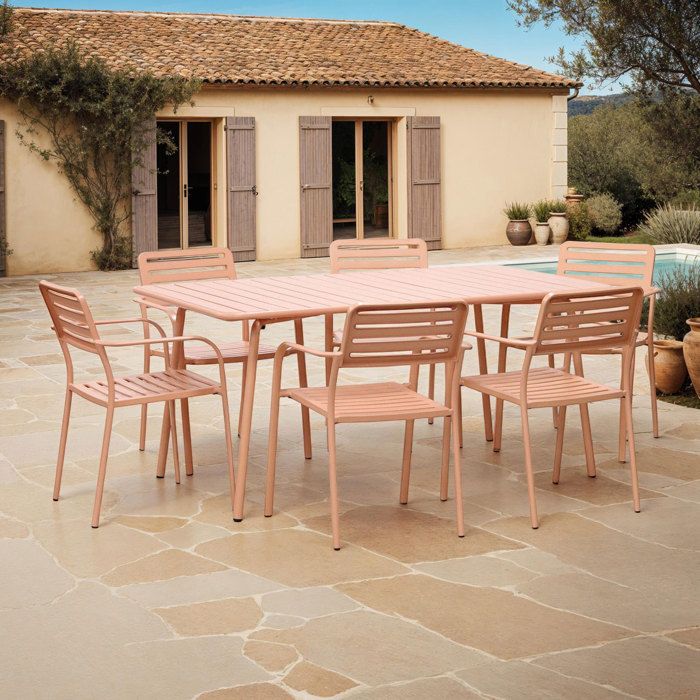 Table de jardin + 6 fauteuils empilables en métal terracotta - BACA