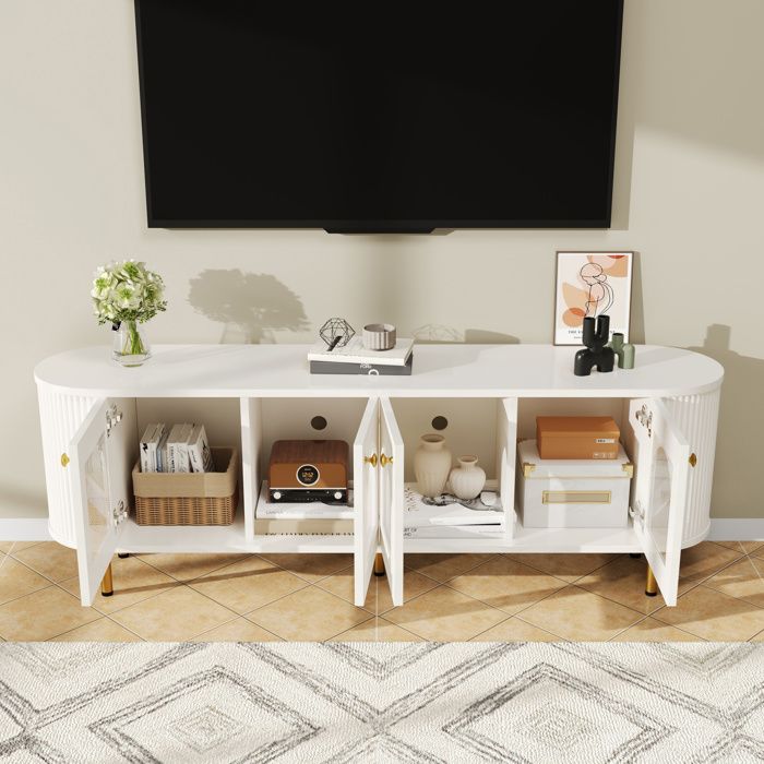 Meuble TV plaque basse avec porte en verre meubles de rangement pratiques dans le salon poignées et pieds dorés