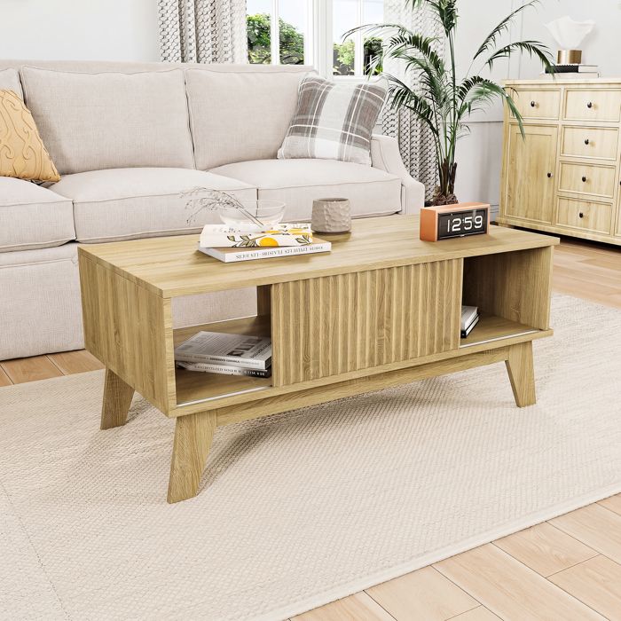 Table basse en bois clair 95cm porte coulissante rainurée rangement ouvert pieds solides et stables salon moderne scandinave