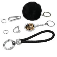 Porte-clés en strass motif Bélier pour femmes et filles avec mousqueton en peluche - Noir. 48