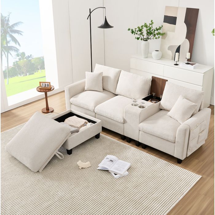 Canapé d’angle modulable 4 places en L beige en velours côtelé avec console 2 porte-gobelets USB et pouf coffre