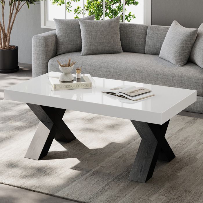 MEULVA Table basse rectangulaire 100x50x40 cm finition brillante blanc et noir MDF pieds en X