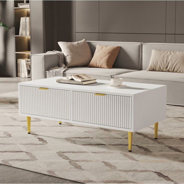 Table basse rectangulaire blanche et dorée 100x50x40 cm 2 tiroirs MDF laqué design à rainures verticales TYNQER