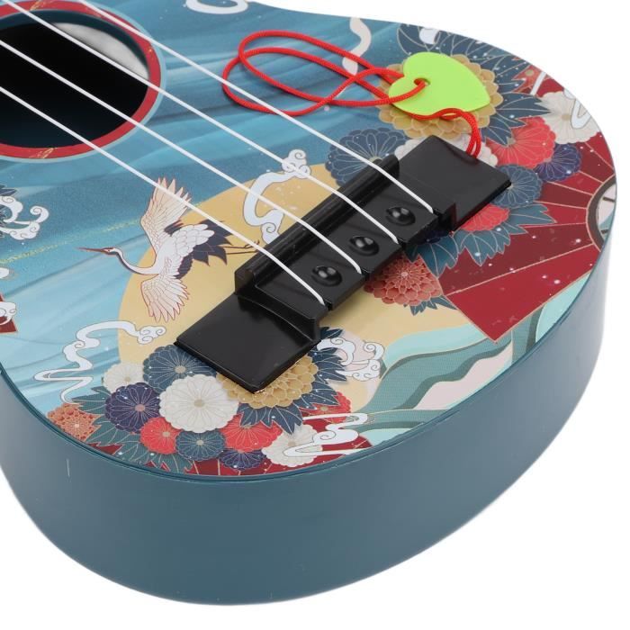 Ukulélé jouet pour enfants Mini instrument de musique en plastique pour  enfants d'âge préscolaire instruments ukulele Rouge - Cdiscount Instruments  de musique
