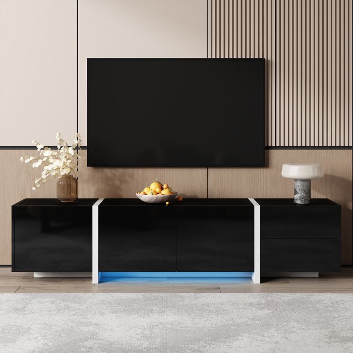 Téléviseur avec armoire basse armoire noire haute brillance avec des jambes blanches contrastantes ainsi que des portes et des