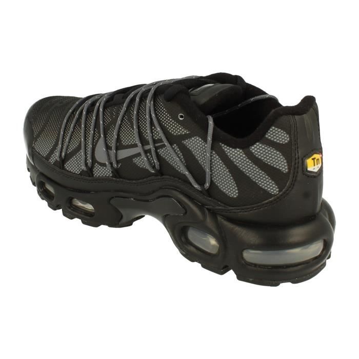 black and silver air max plus