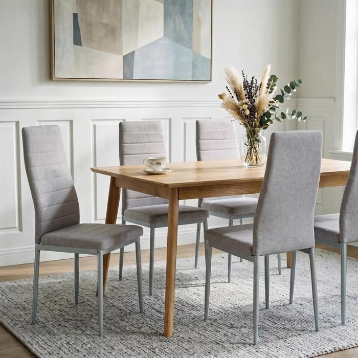Lot de 4 chaises de salle à manger NATHALIE piètement métallique couleur aluminium et revêtement en tissu gris Lot de 4 chaises de salle à manger NATHALIE piètement métallique couleur aluminium et revêtement en tissu gris