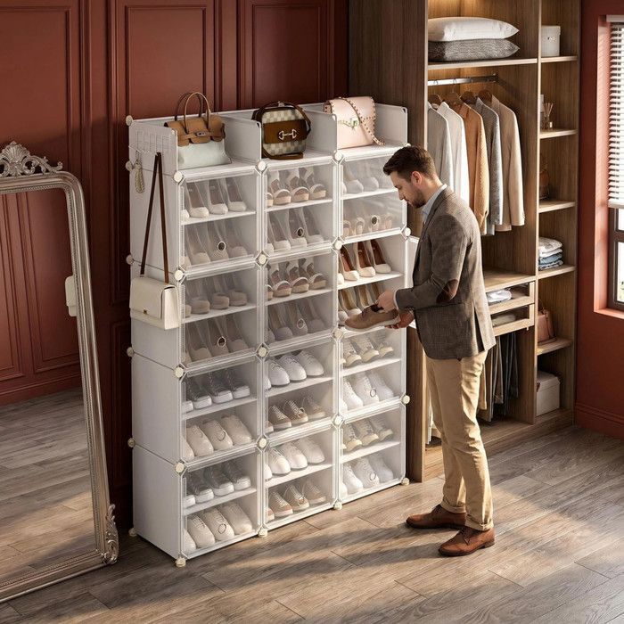 Ce spacieux meuble à chaussures à 12 compartiments et portes peut contenir jusquà 54 paires de chaussures