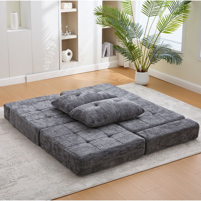 Canapé-lit pliable gris en chenille avec dossier et coussins tête/lombaires