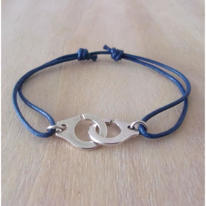 Bracelet menotte argenté et cordon bleu marine 