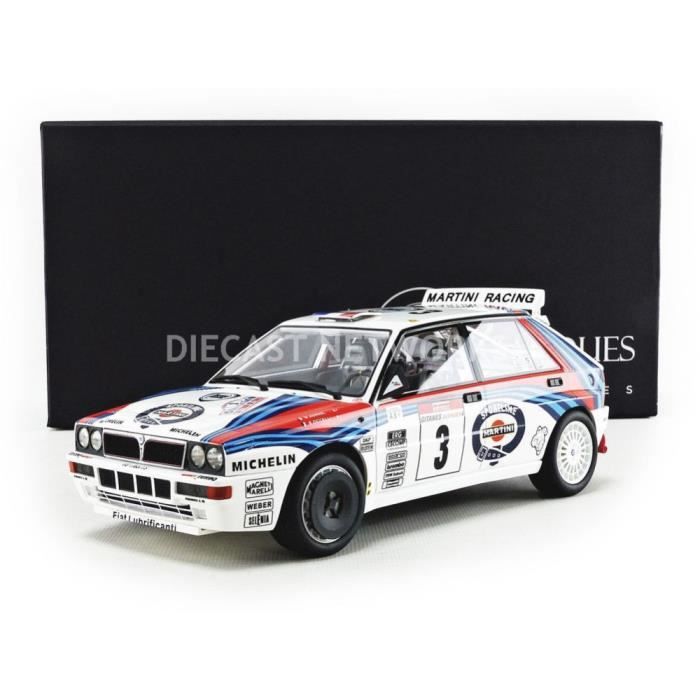 Voiture Miniature de Collection - TOP MARQUES COLLECTIBLES 1/18 - LANCIA Delta 4WD - Winner Tour de Corse 1992 - White / Blue / Red