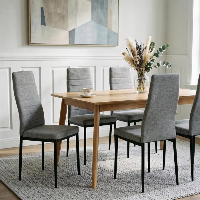 Lot de 4 chaises de salle à manger NATHALIE piètement métallique couleur noir et revêtement en tissu gris Lot de 4 chaises de salle à manger NATHALIE piètement métallique couleur noir et revêtement en tissu gris