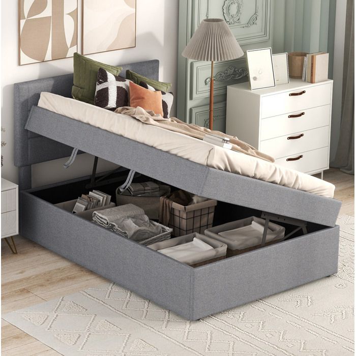 Lit coffre capitonné 90 x 200 cm gris avec sommier à lattes rangement intégré sans matelas