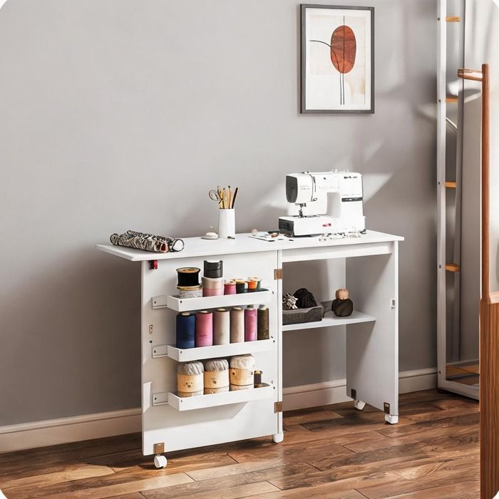 Meuble à abattant en panneau de particules table de couture pliante sur roulettes avec rangements