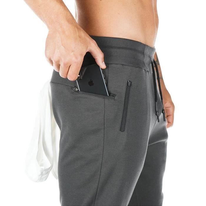 Jogging gris foncé, ceinture élastique, poches zip