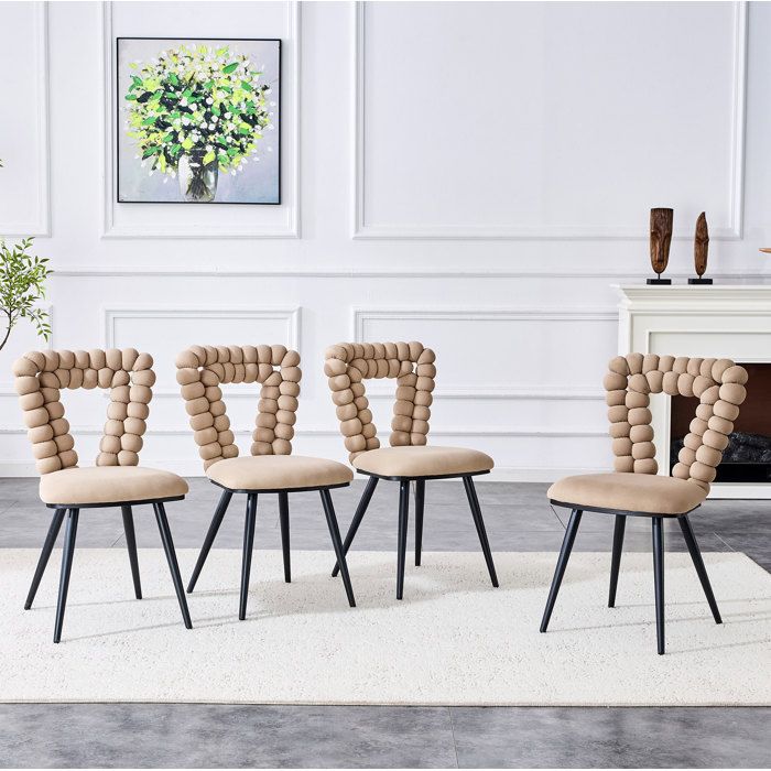 Chaises en velours lot de 2 dossier à ouverture triangulaire pieds métalliques noirs salle à manger