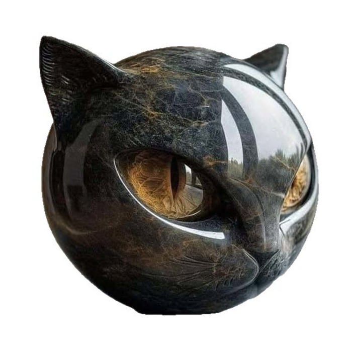 Ornements Cette sculpture grise en forme de tête de chat est faite de résine et possède une texture similaire à celle de la pierre