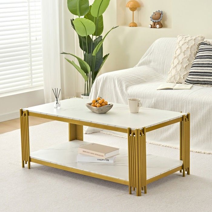 Table basse - MINIMAL - MINIMAL HOME - rectangulaire - pieds métal doré - plateau imitation marbre blanc 114x64x46 cm Table basse - MINIMAL - MINIMAL HOME - rectangulaire - pieds métal doré - plateau imitation marbre blanc 114x64x46 cm