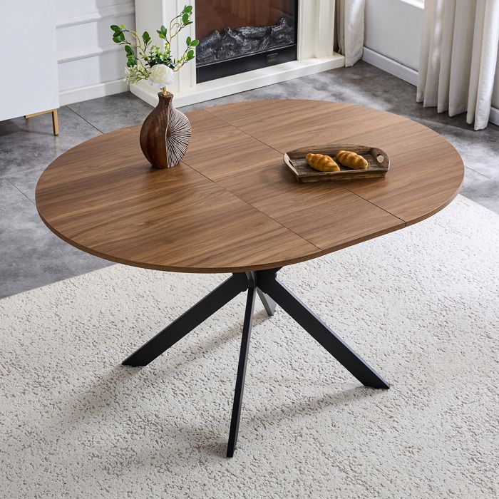 Table extensible moderne - Extensible ronde à ovale - Capacité 4 à 6 personnes - Aspect noyer chaleureux