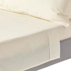 HOMESCAPES Drap plat uni 100% coton égyptien 200 fils coloris crème 270 x 300 cm