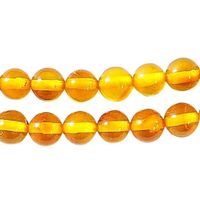 Fil de 85 perles rondes 4mm en ambre jaune fonçé